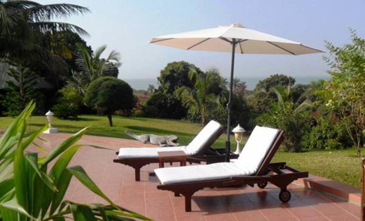 White Horse Residence Tanji Bagian luar foto